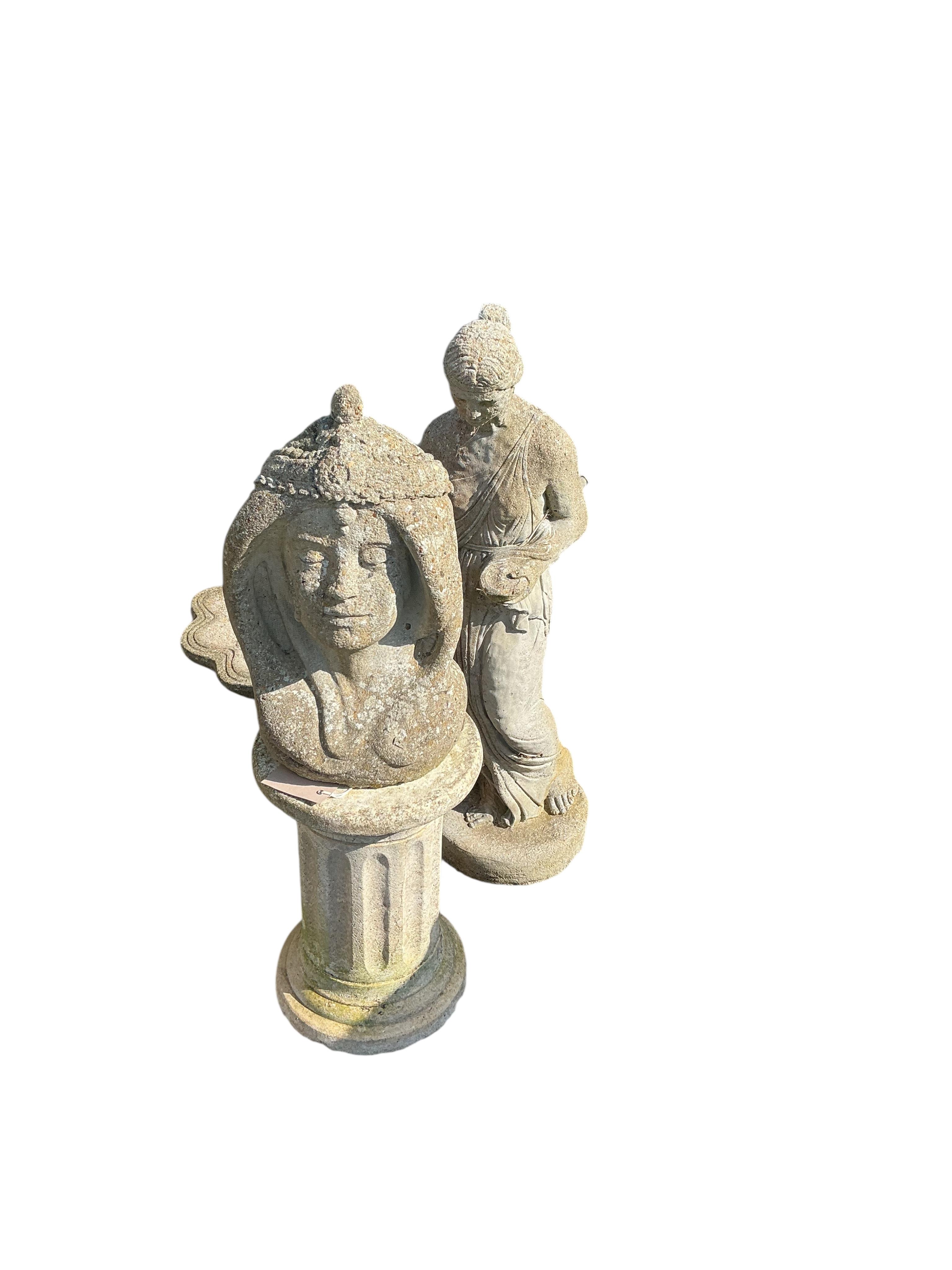A reconstituted stone urn on pedestal, a stone bust on pedestal, a shell bird bath and a female statue, largest height 72cm